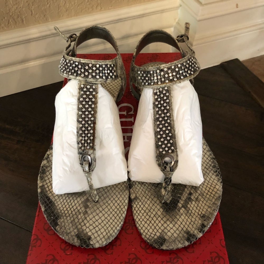 Guess Faux snake skin sandals with rhinestones.